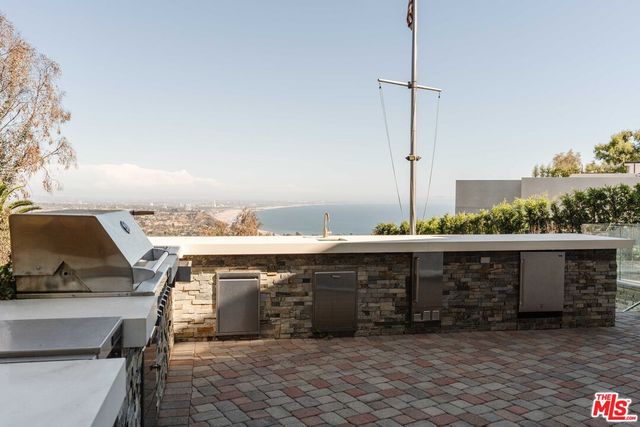 a view of outdoor space and barbecue grill