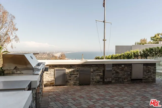 a view of outdoor space and barbecue grill