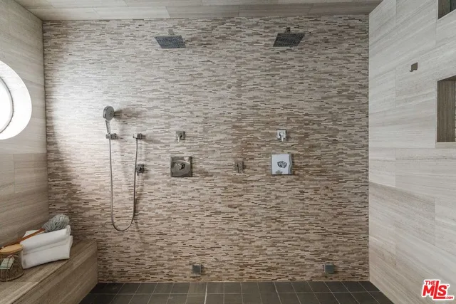 a kitchen with a refrigerator and a sink