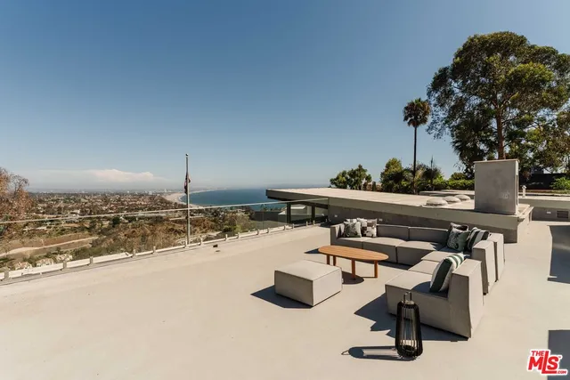a view of a house with a large window