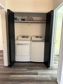 a utility room with washer and dryer