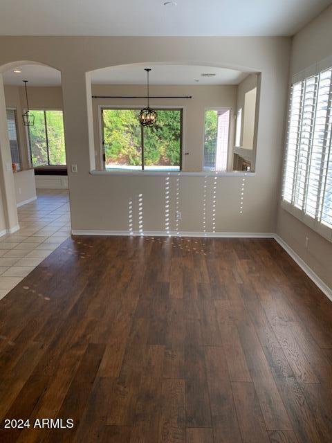 5246 East Estevan Road Phoenix, AZ 85054 - Photo 8 of 40 Vinyl plank flooring in LR / DR
