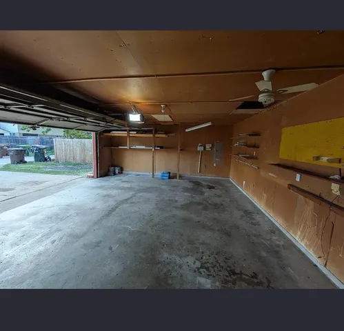 a view of backyard with seating space