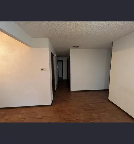 a view of hallway with stairs