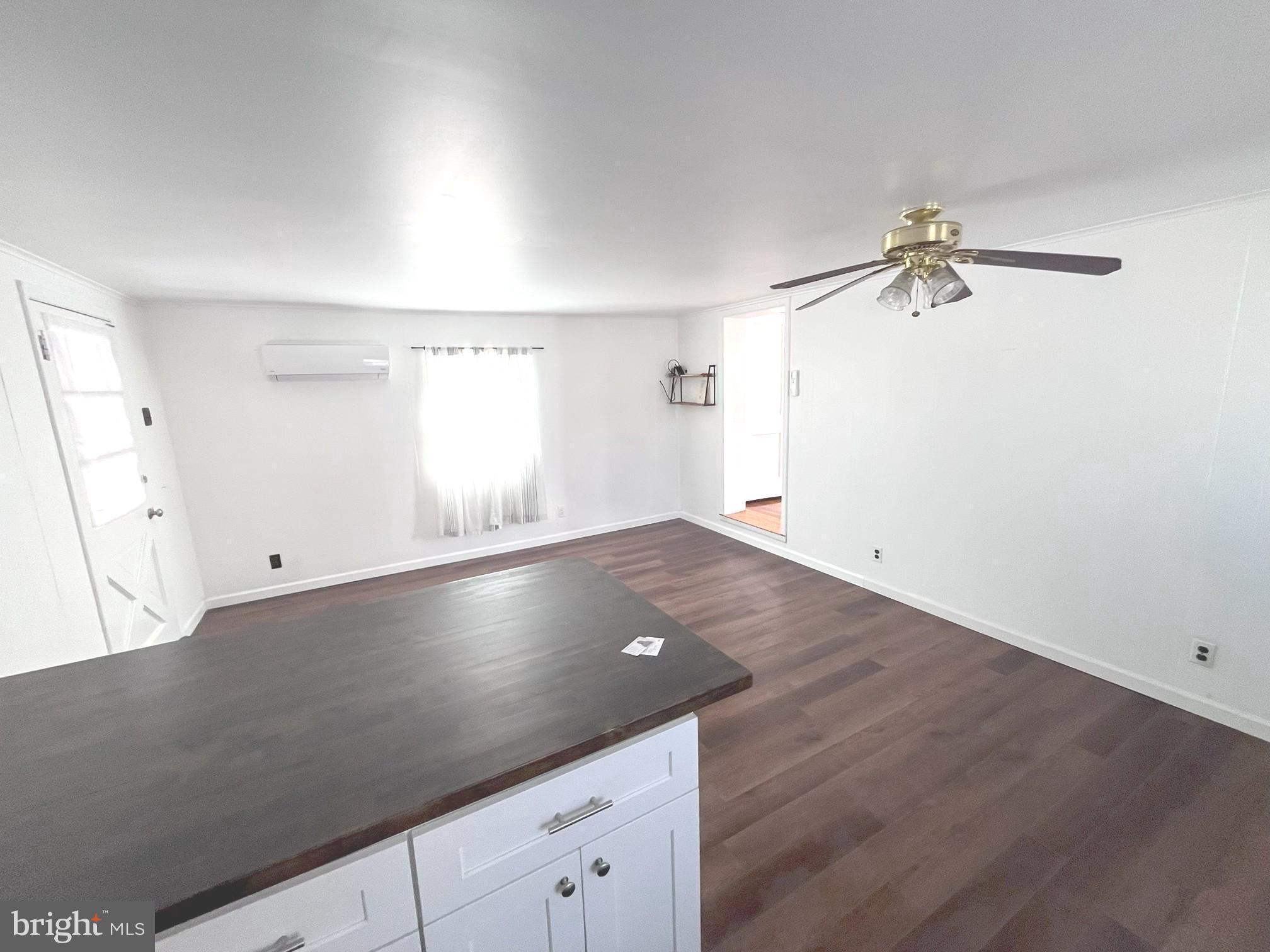 29 School Lane Springfield, PA 19064 - Photo 18 of 29 an empty room with a window and ceiling fan