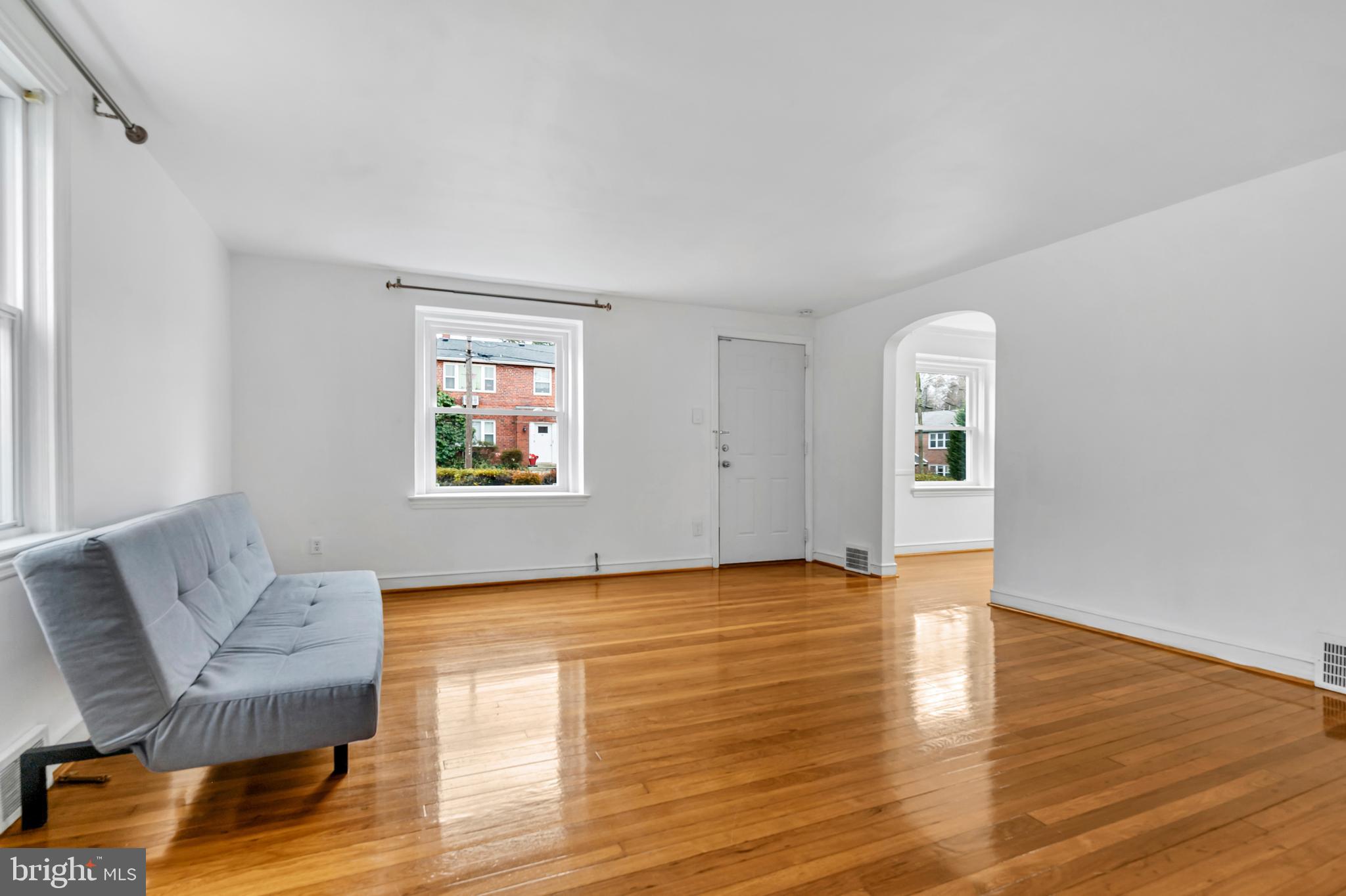 29 School Lane Springfield, PA 19064 - Photo 4 of 29 a view of livingroom with furniture wooden floor and window