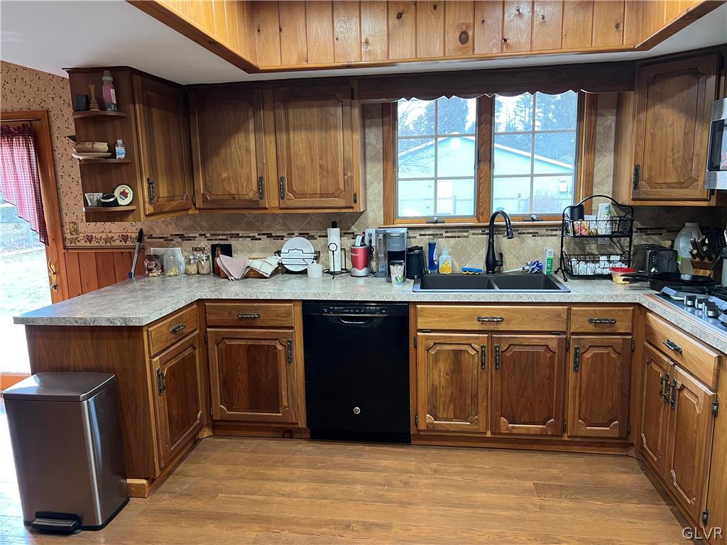 684 Williams Road Nazareth, PA 18064 - Photo 13 of 28 a kitchen with stainless steel appliances granite countertop a sink stove and cabinets