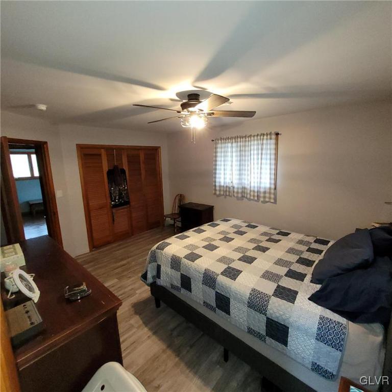 684 Williams Road Nazareth, PA 18064 - Photo 17 of 28 a bedroom with bed and mirror with window