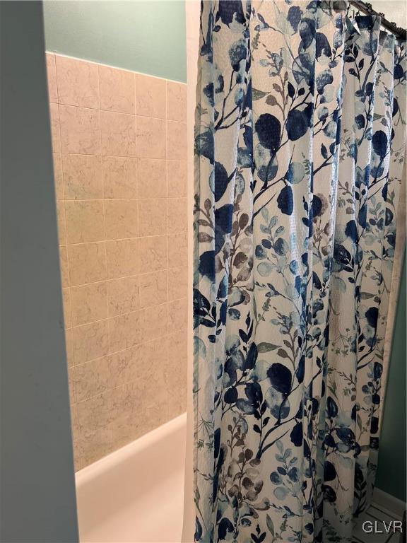 684 Williams Road Nazareth, PA 18064 - Photo 19 of 28 a bathroom with a shower curtain