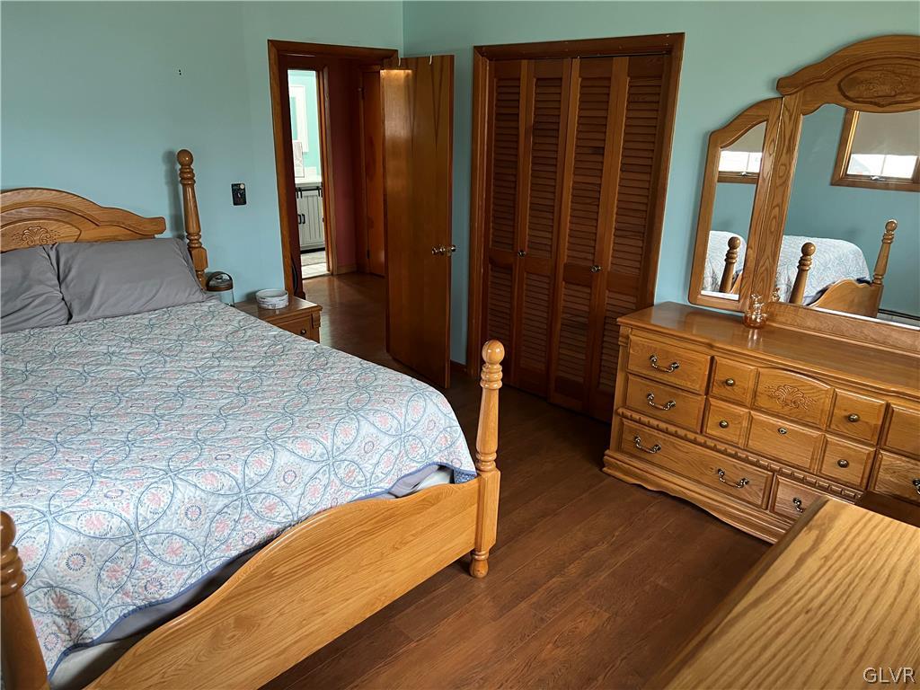 684 Williams Road Nazareth, PA 18064 - Photo 22 of 28 a bedroom with a bed a dresser and mirror