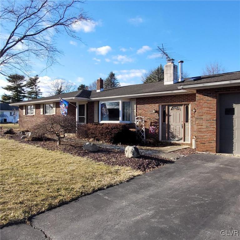 684 Williams Road Nazareth, PA 18064 - Photo 5 of 28 a front view of a house with garden