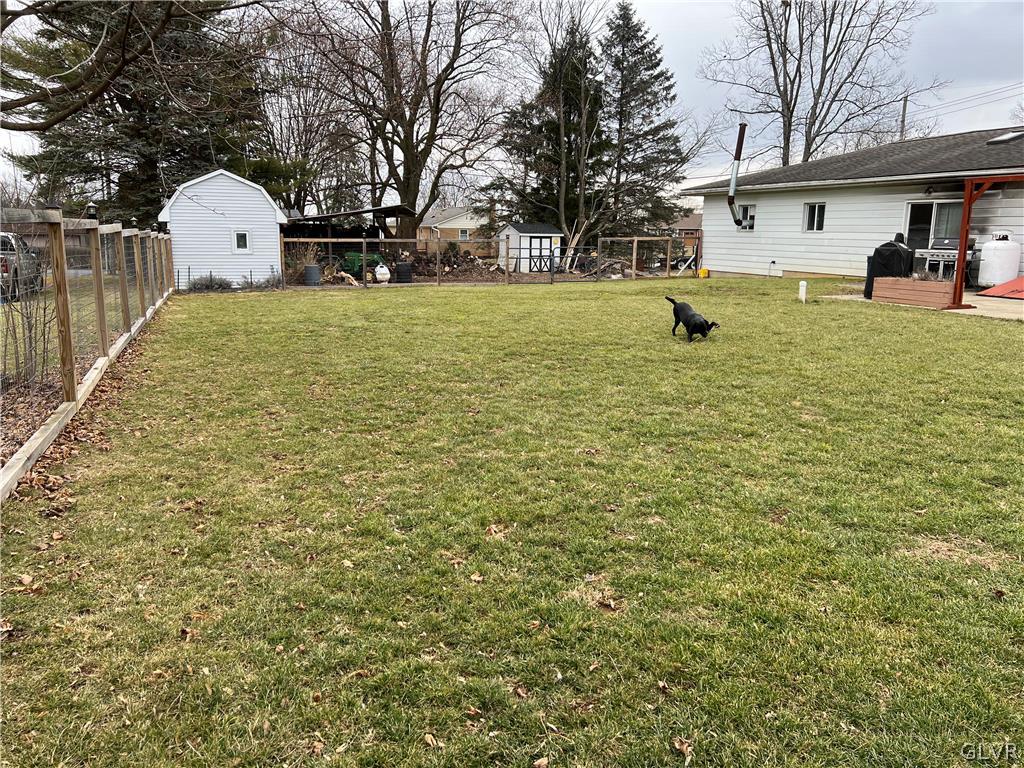 684 Williams Road Nazareth, PA 18064 - Photo 6 of 28 a view of a yard with a house and a tree