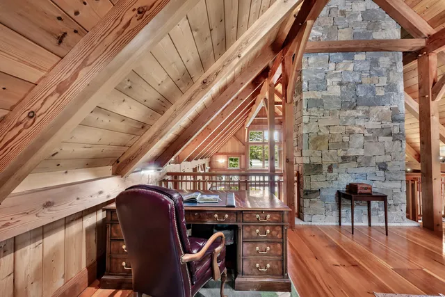 a view of a chairs and table in a patio
