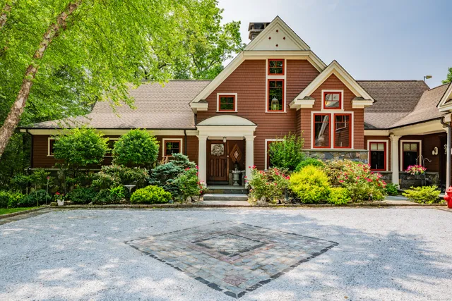 a front view of a house with garage