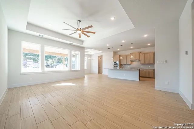 a view of kitchen and windows