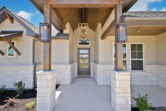 a front view of a house with an outdoor space