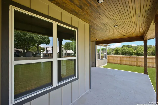 a view of swimming pool with a yard
