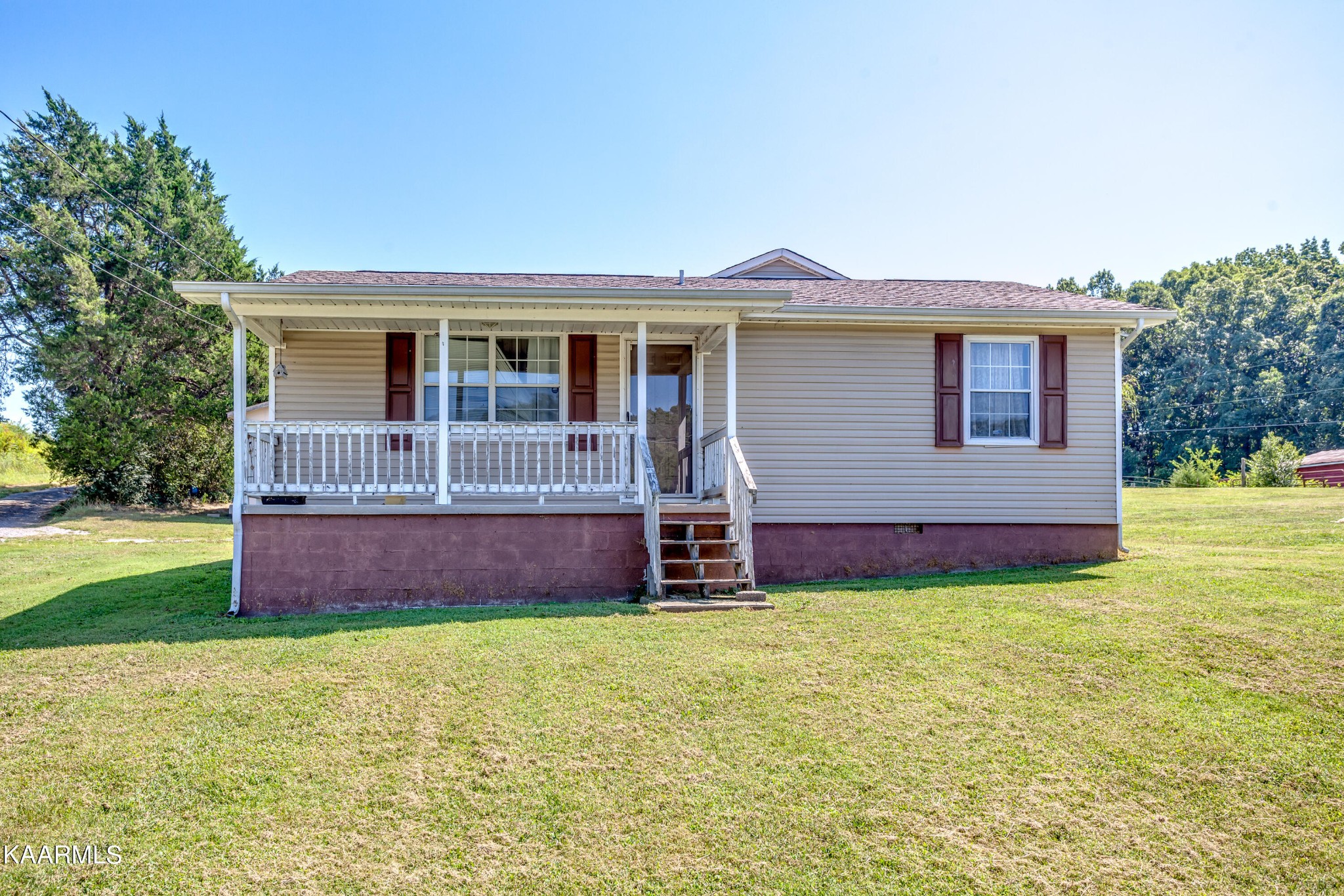 788 Seed Tick Road Philadelphia, TN 37846 - Photo 1 of 14 a front view of house with yard and entertaining space