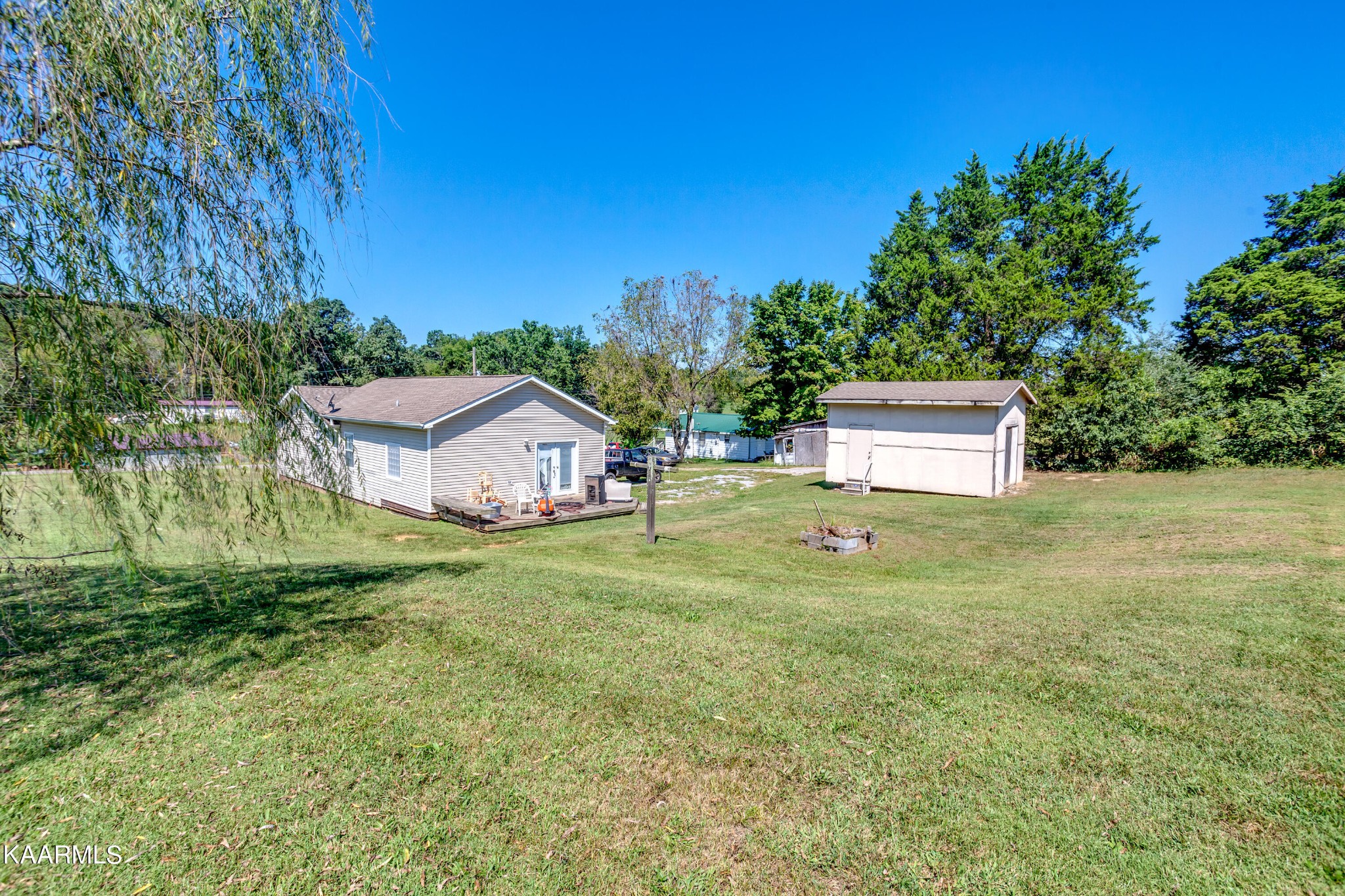 788 Seed Tick Road Philadelphia, TN 37846 - Photo 11 of 14 a house view with a garden space