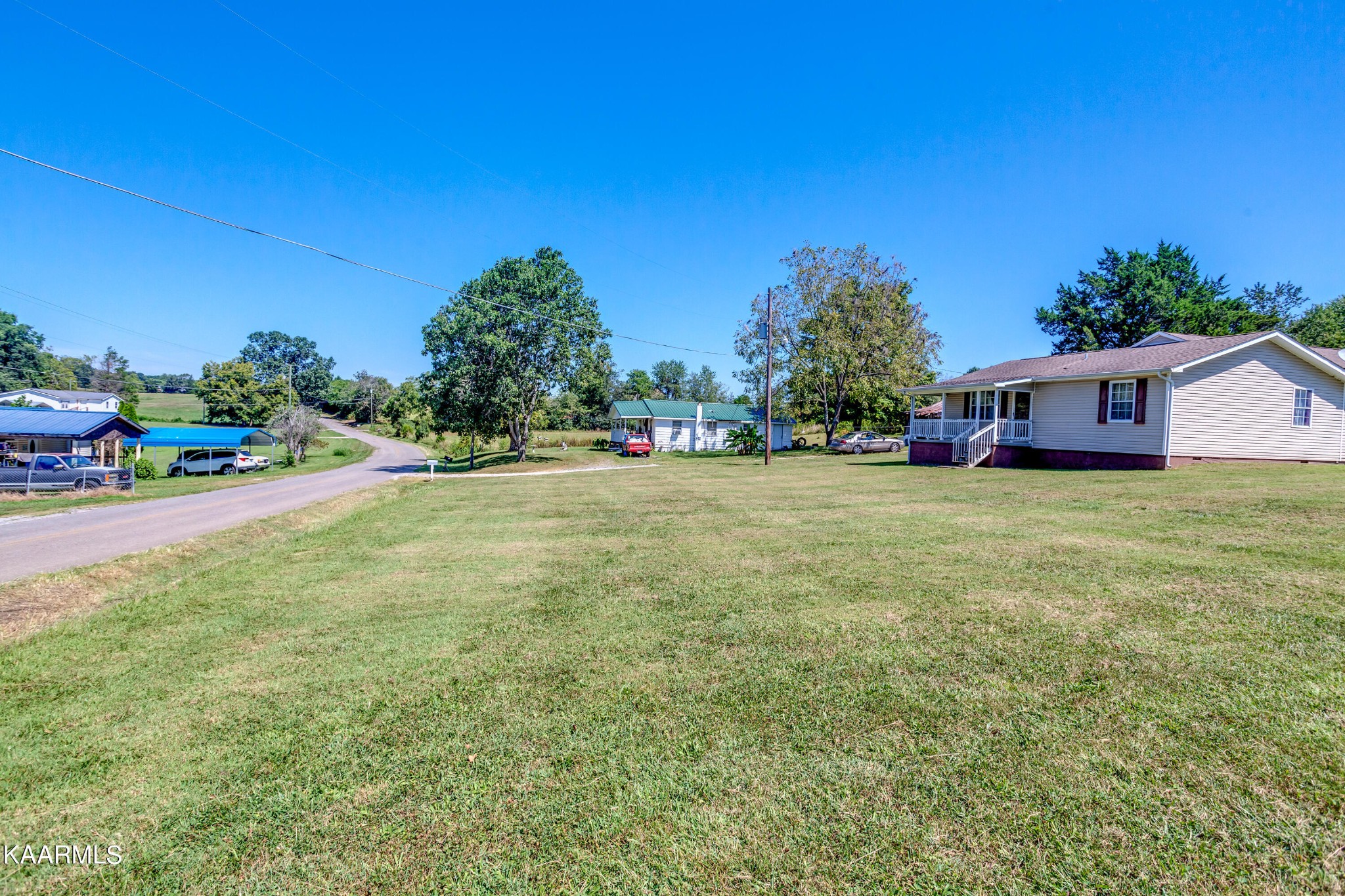 788 Seed Tick Road Philadelphia, TN 37846 - Photo 4 of 14 a view of a house with a big yard