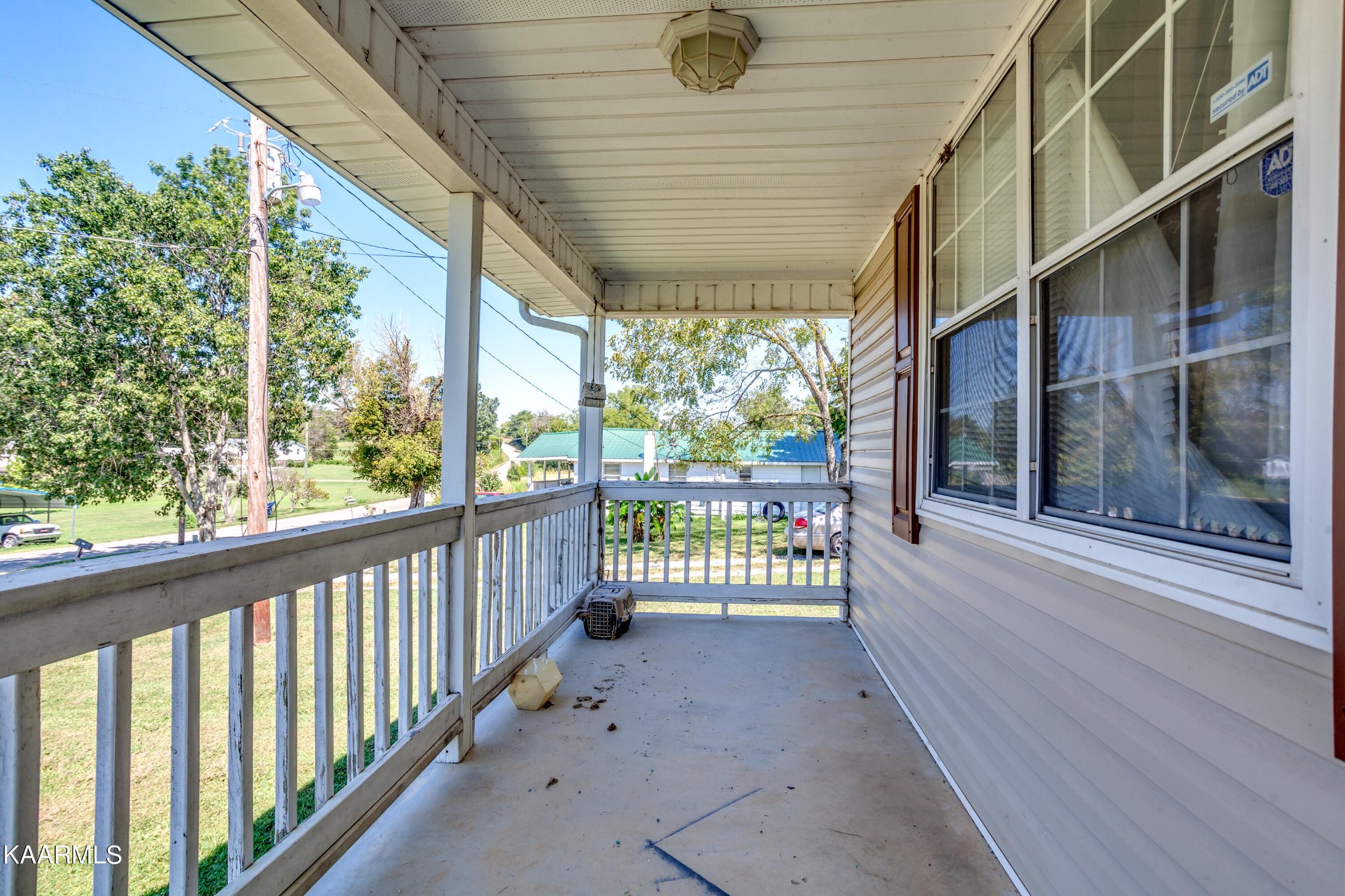 788 Seed Tick Road Philadelphia, TN 37846 - Photo 8 of 14 a view of a porch with a floor to ceiling window
