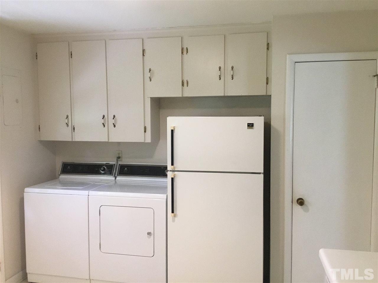 519 West Cornwall Road Cary, NC 27511 - Photo 8 of 29 Laundry area in the kitchen