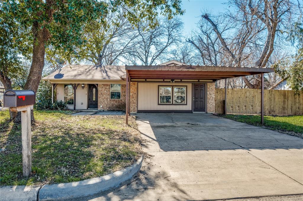 8321 Hanon Drive White Settlement, TX 76108 - Photo 1 of 1 a front view of a house with garden