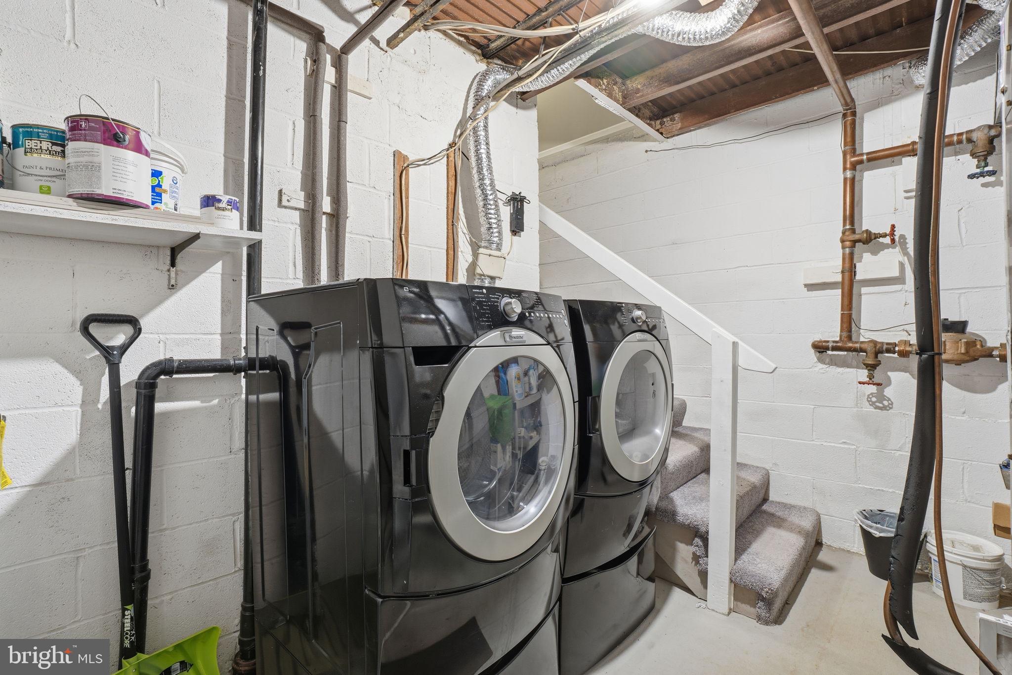 9175 Broken Oak Place, Unit 39B Burke, VA 22015 - Photo 32 of 35 a utility room with dryer and washer