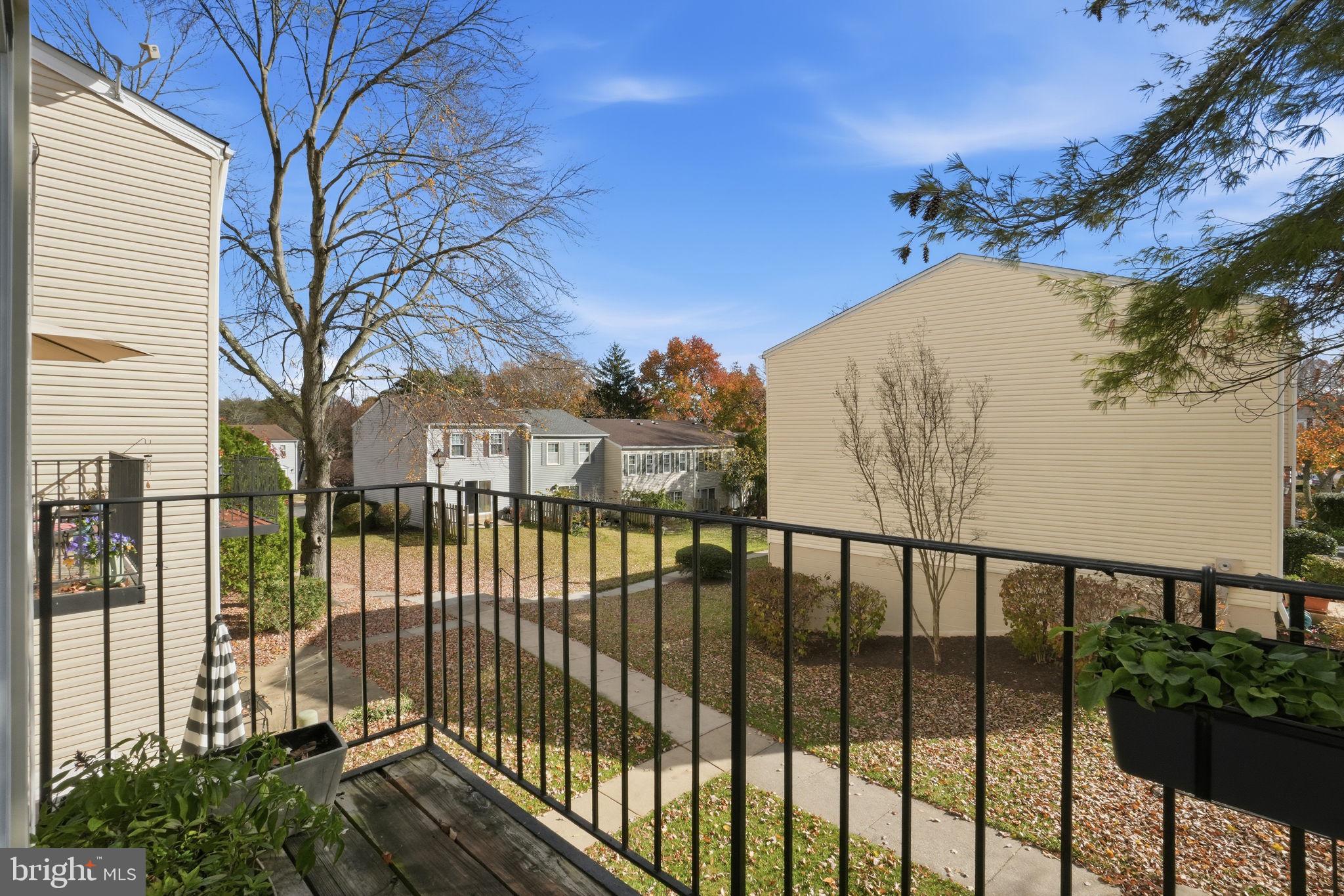 9175 Broken Oak Place, Unit 39B Burke, VA 22015 - Photo 33 of 35 a view of a houses with a small yard