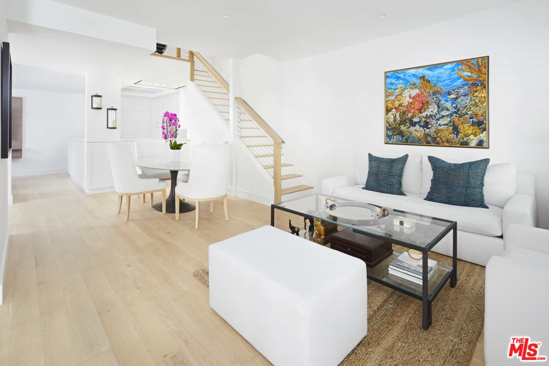 52 Olive Road Santa Barbara, CA 93108 - Photo 1 of 13 a living room with furniture and a wooden floor