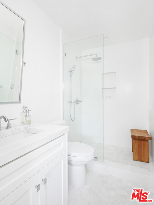 52 Olive Road Santa Barbara, CA 93108 - Photo 12 of 13 a bathroom with a sink a toilet and a shower