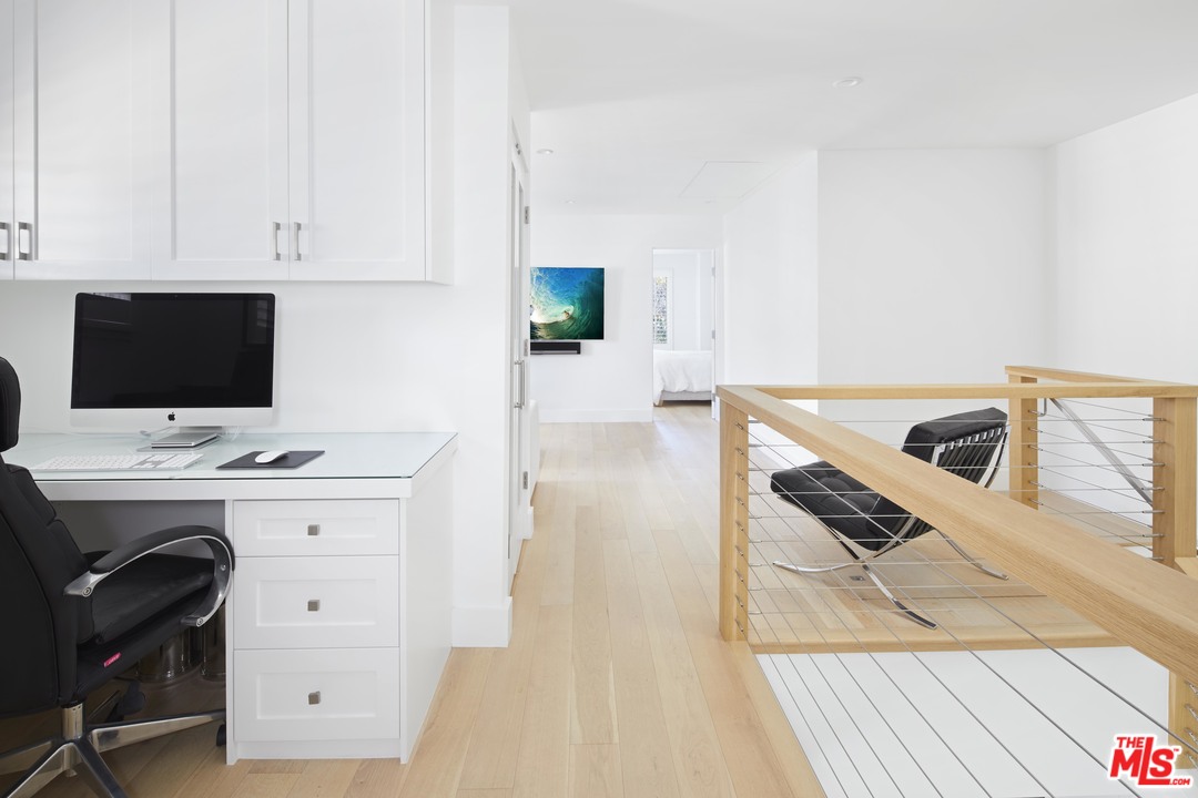 52 Olive Road Santa Barbara, CA 93108 - Photo 8 of 13 a view of workspace with wooden floor