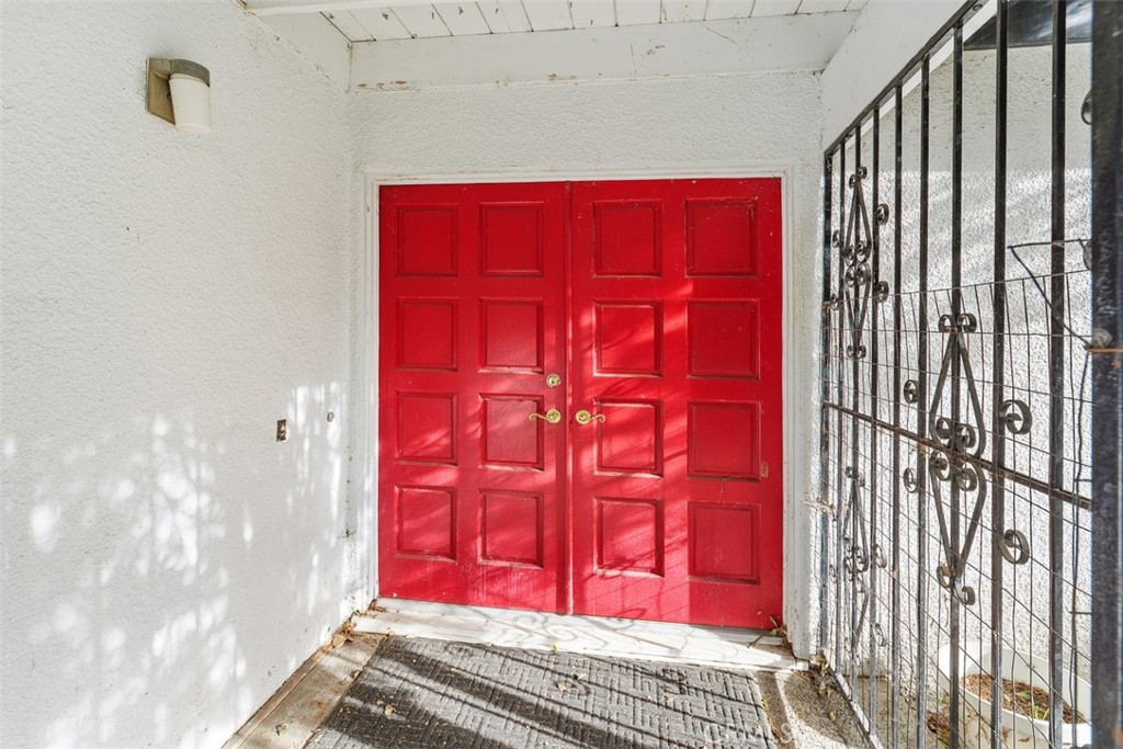 4121 Park View Terrace Riverside, CA 92501 - Photo 12 of 41 a view of a red door and a red gate