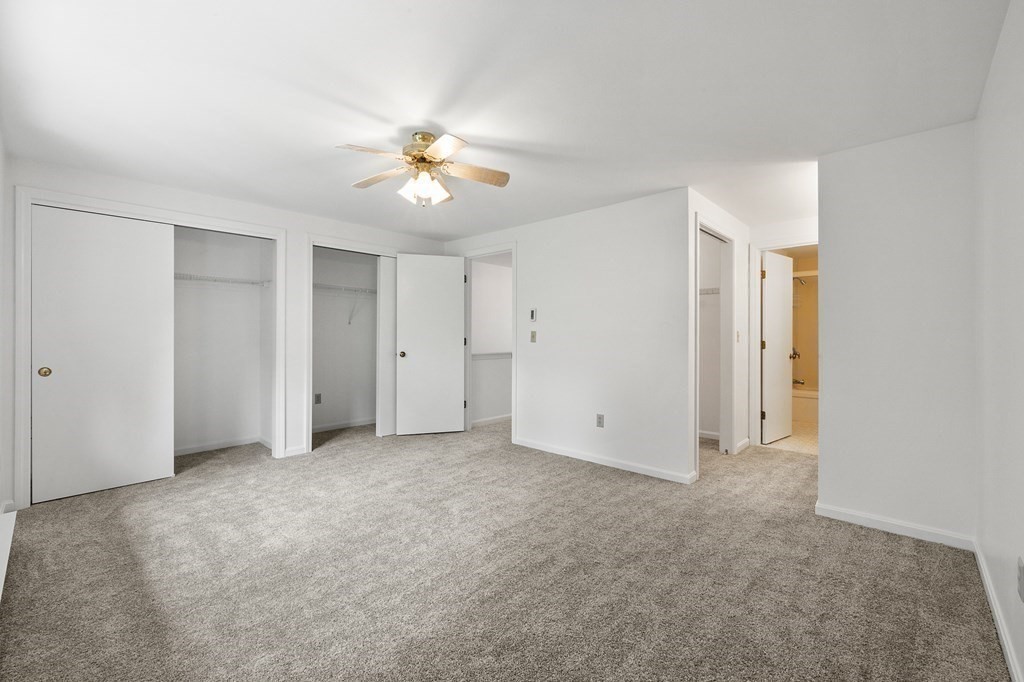 174 Lowell Road, Unit 135 Mashpee, MA 02649 - Photo 14 of 21 wooden floor in an empty room