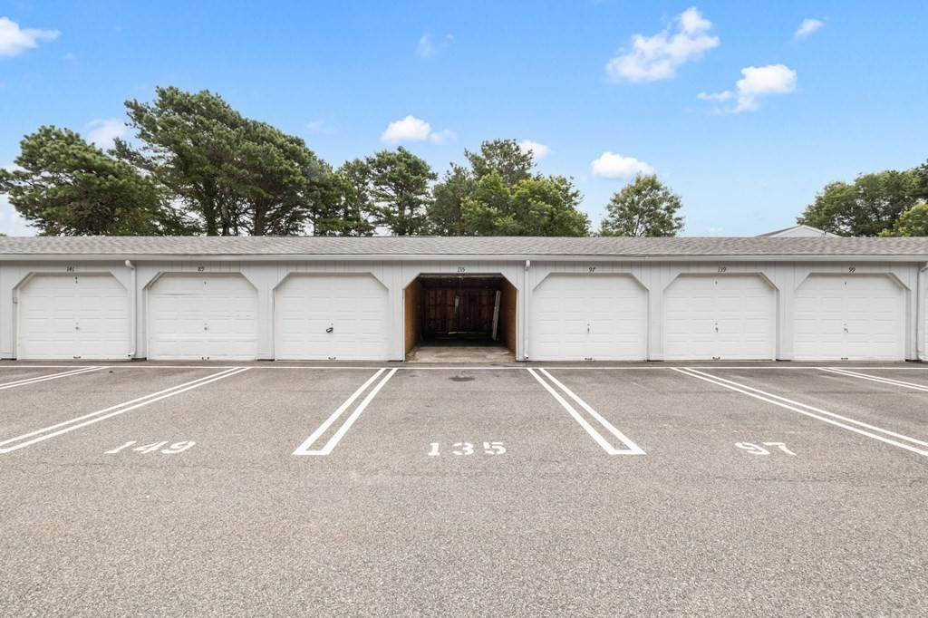 174 Lowell Road, Unit 135 Mashpee, MA 02649 - Photo 19 of 21 a view of garage and utility room