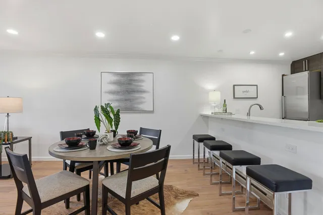 a view of a dining room with furniture