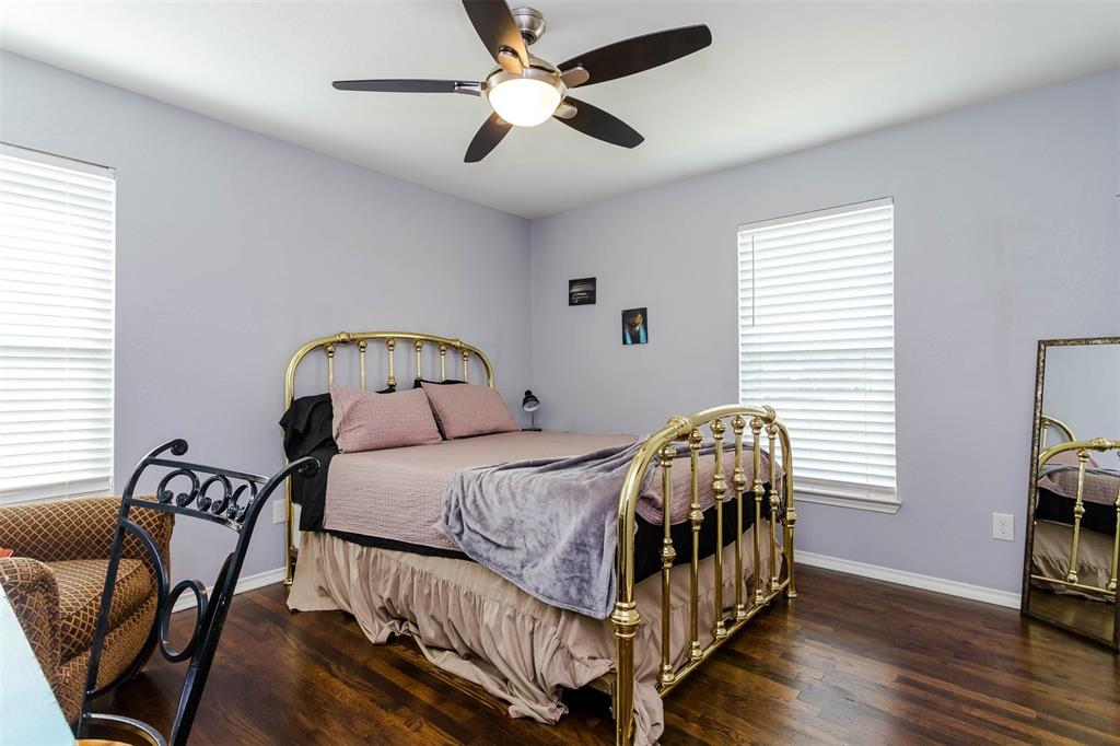 1333 South Pine Street Grapevine, TX 76051 - Photo 26 of 33 a bedroom with a bed and a chair