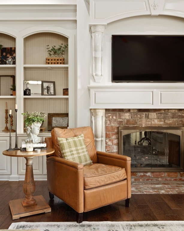 216 Vista Lane Georgetown, TX 78633 - Photo 14 of 40 a living room with furniture and a fireplace
