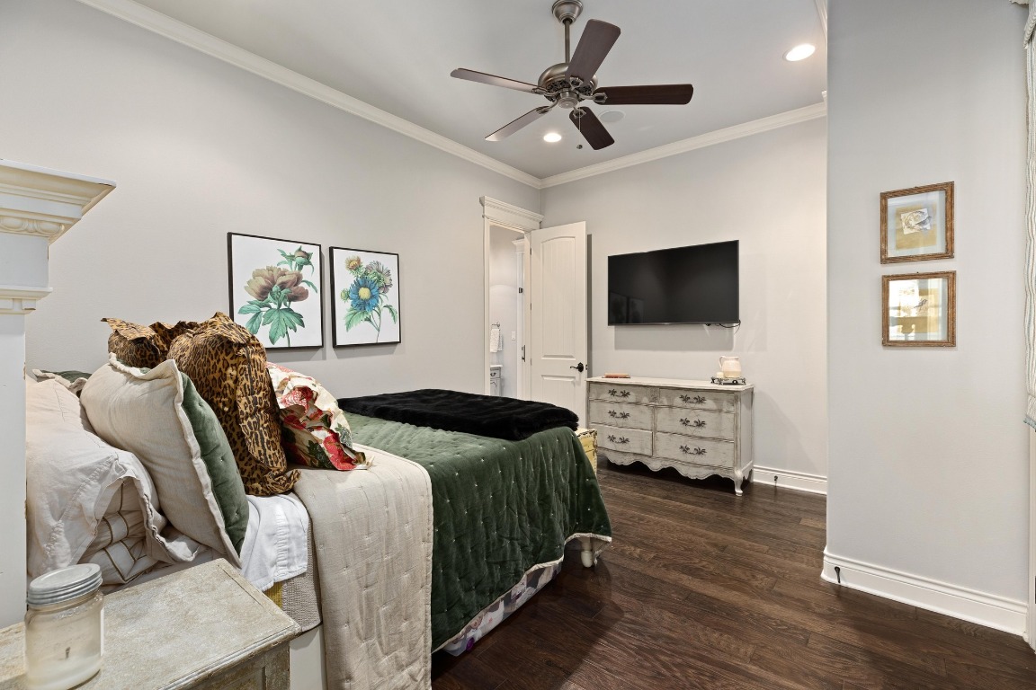 216 Vista Lane Georgetown, TX 78633 - Photo 33 of 40 a bedroom with a bed and a flat screen tv