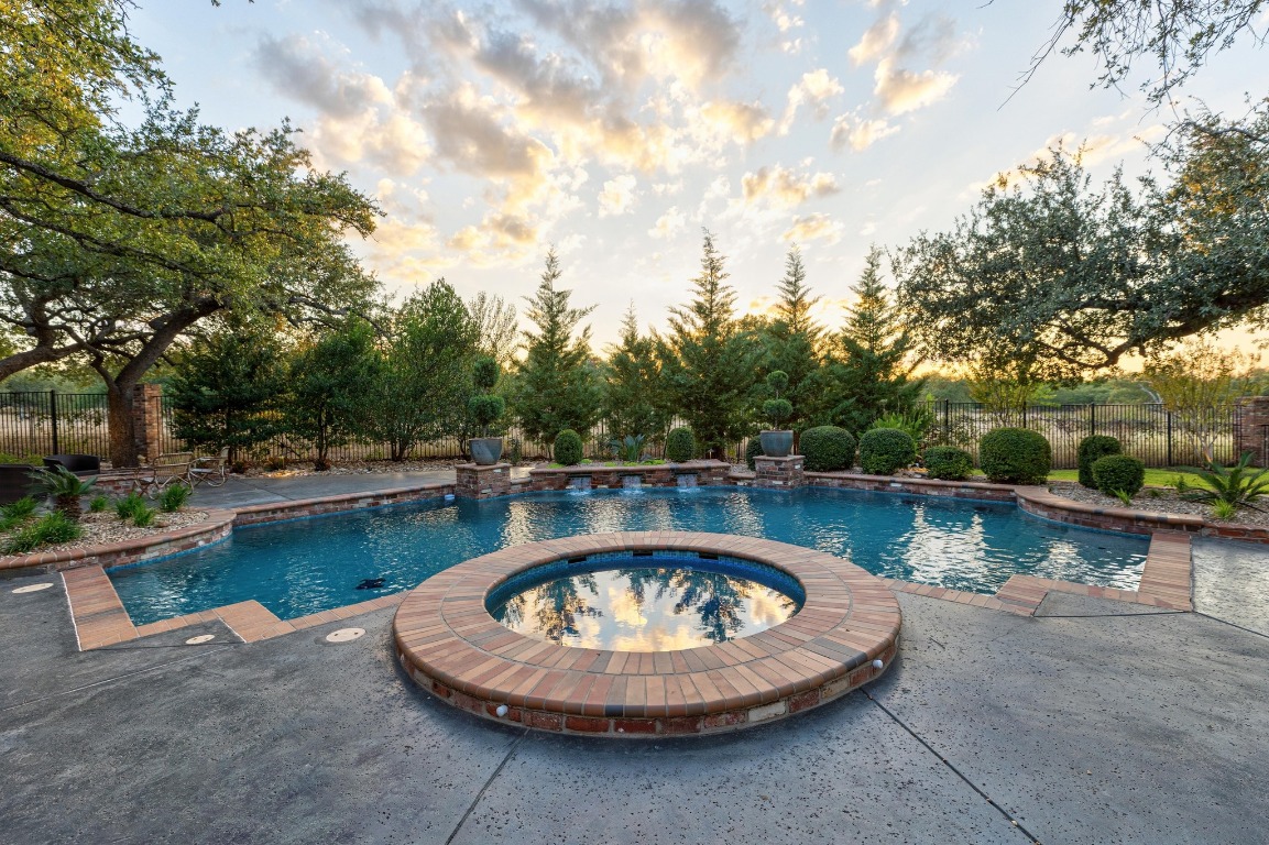 216 Vista Lane Georgetown, TX 78633 - Photo 4 of 40 a view of a swimming pool with lounge chair