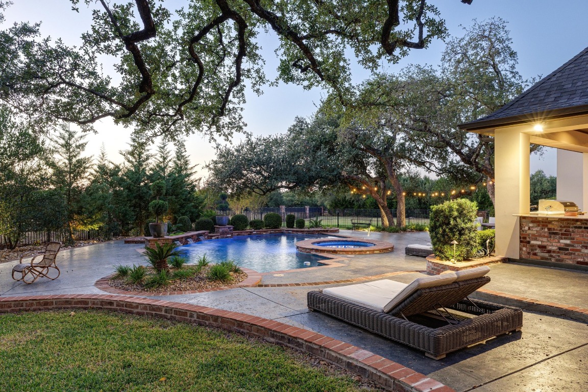 216 Vista Lane Georgetown, TX 78633 - Photo 6 of 40 swimming pool with outdoor seating and trees