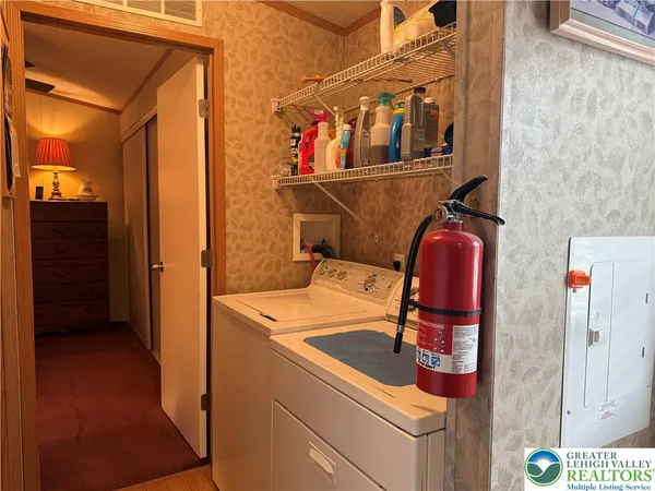 a utility room with dryer and washer