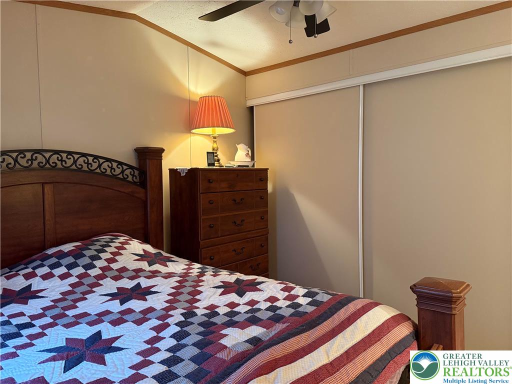 15 Chestnut Ridge Circle Kunkletown, PA 18058 - Photo 25 of 31 a bedroom with a bed and a dresser