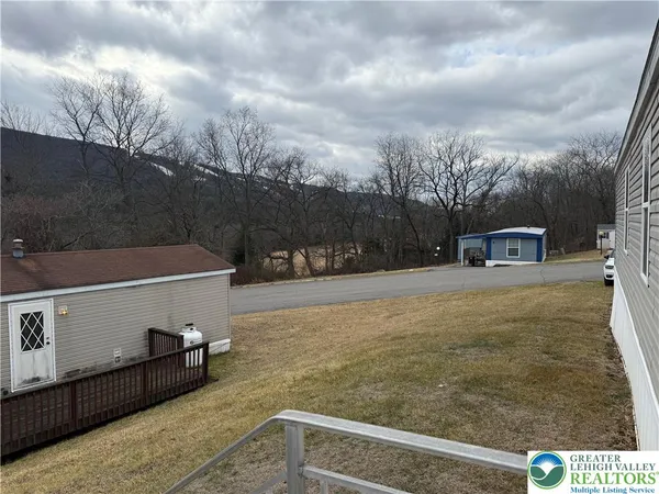 a view of outdoor space and yard
