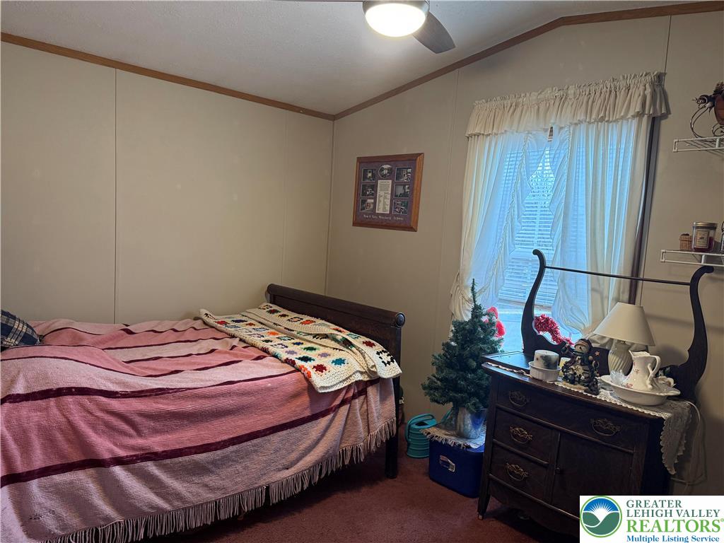 15 Chestnut Ridge Circle Kunkletown, PA 18058 - Photo 9 of 31 a bedroom with a bed and wooden floor