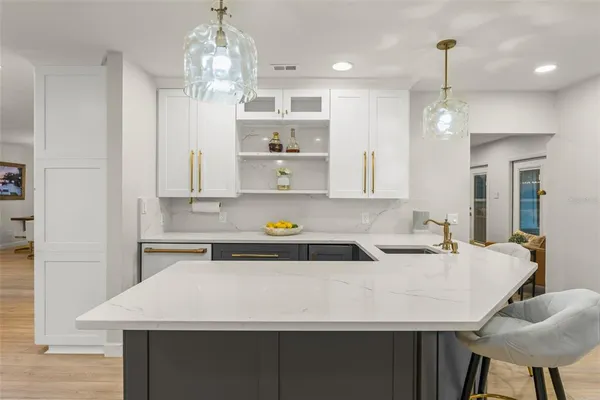 a room with furniture and pool table