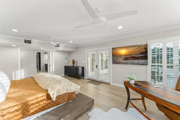 a living room with fireplace furniture and a wooden floor