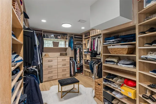 a kitchen with a stove a refrigerator and a fireplace