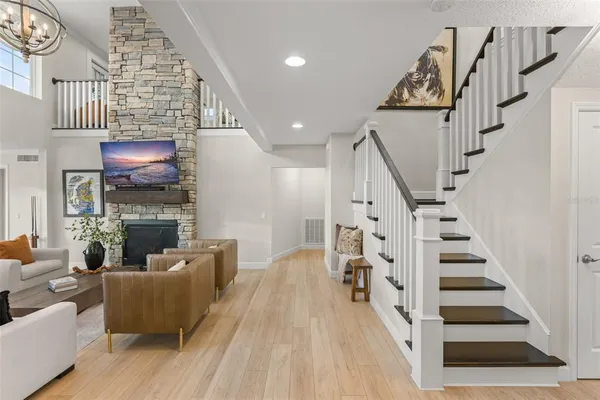 a living room with furniture and a window
