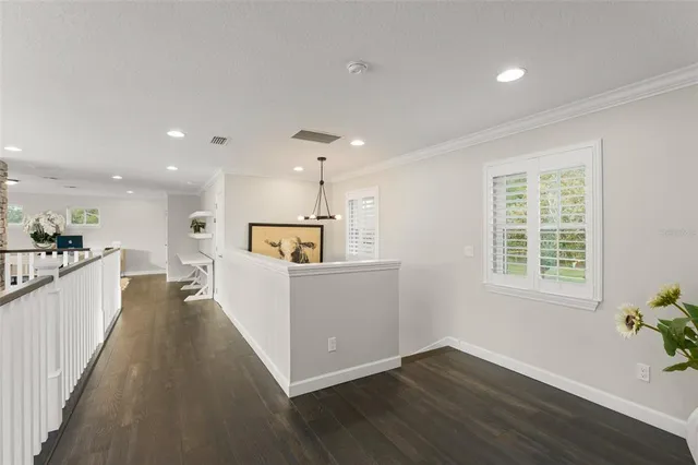 a bathroom with a shower curtain and a toilet